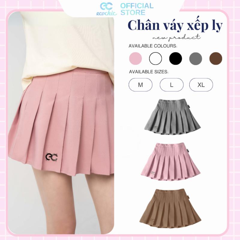 Váy xếp ly ngắn cạp cao phối áo croptop đen